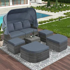 Outdoor Gray Wicker Daybed with Cushions and Retractable Canopy