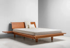 Platform Bed - The is minimalist to its core, stripping away pretense with its series of broad, surrounding surfaces