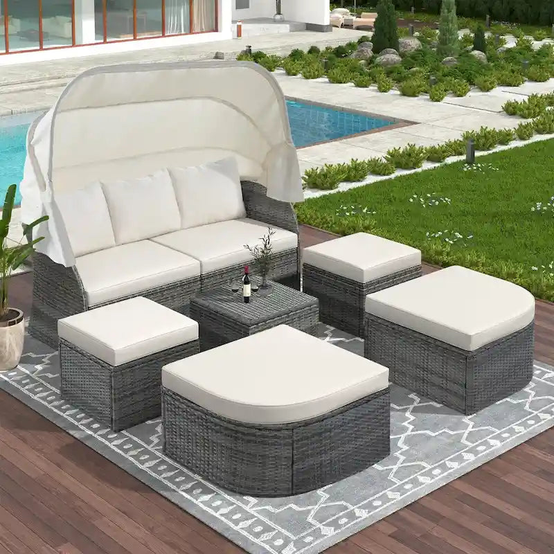 Outdoor Gray Wicker Daybed with Cushions and Retractable Canopy